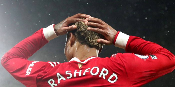 1200x1200 Download Marcus Rashford Holding His Head Wallpaper | Wallpapers.com