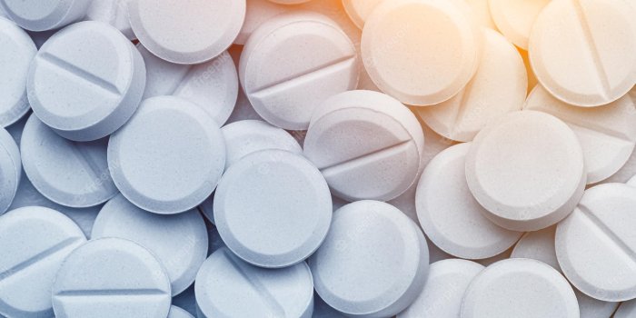 2000x1333 Premium Photo | Lots of round white pills pharmacy medicines background  wallpaper texture