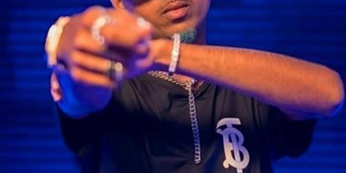 1000x1777 Download Mc Stan Hip Hop Artist Wallpaper | Wallpapers.com