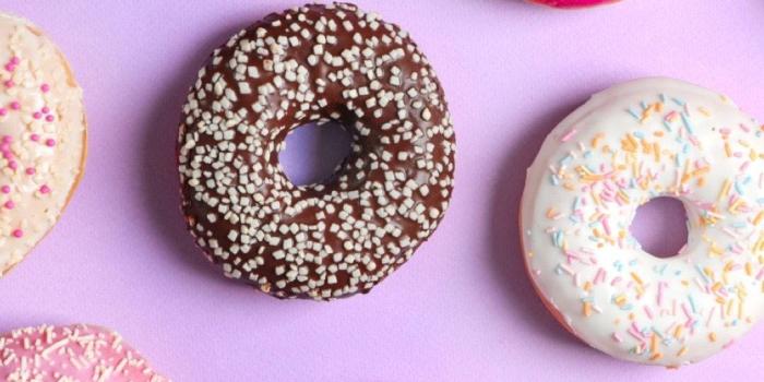 1080x1920 Download Pastel Phone Colored Donuts Wallpaper | Wallpapers.com