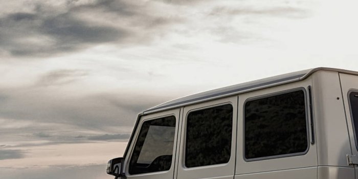 887x1920 Download Mercedes Benz White Wagon Iphone Wallpaper | Wallpapers.com