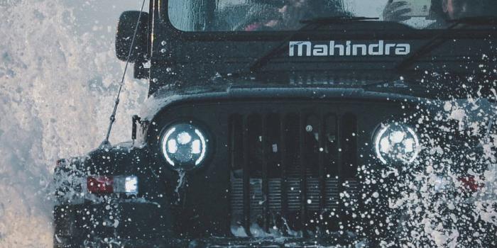 957x1920 Download Caption: Ultimate Off-Road Adventure – Mahindra Thar 4K in Action  Wallpaper | Wallpapers.com