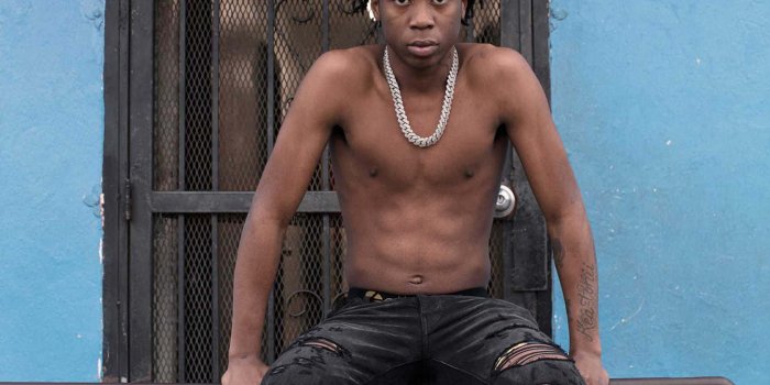 1457x1920 Download Lil Loaded performing at a sold out show Wallpaper | Wallpapers.com