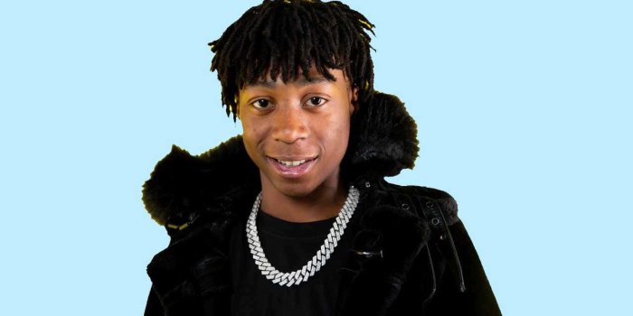 1280x720 Download A Young Man With Dreadlocks And A Necklace Wallpaper | Wallpapers .com