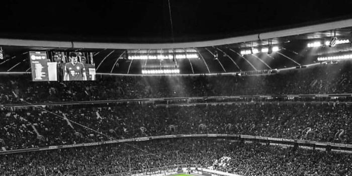 1080x1920 Download A Soccer Stadium With Lights On And A Soccer Game Wallpaper |  Wallpapers.com