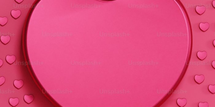1000x1778 A pink heart shaped object on a pink background photo – Heart shape Image  on Unsplash