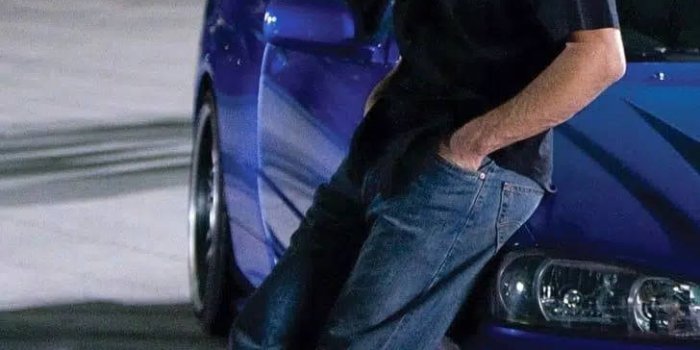 728x1092 Download Paul Walker in his racing car Wallpaper | Wallpapers.com