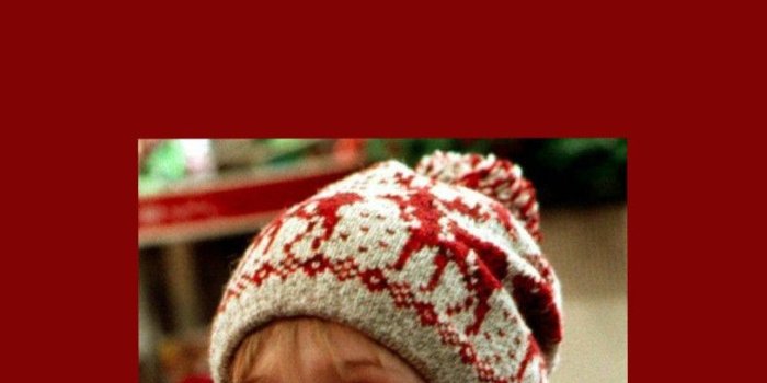 815x1448 Download Home Alone Kevin Smiling Wallpaper | Wallpapers.com