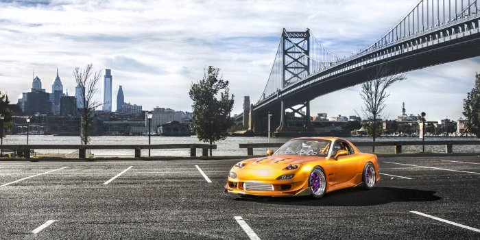 1440x900 Download Vintage Yellow Mazda Rx7 Wallpaper | Wallpapers.com