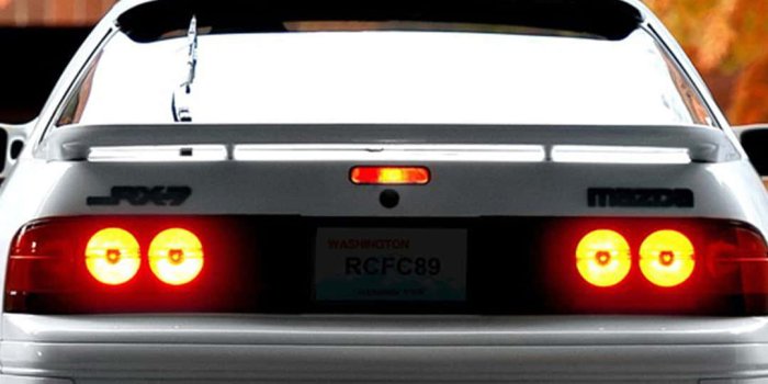 1080x1920 Download Back View Of Mazda Rx7 Fc Classic Code Wallpaper | Wallpapers.com