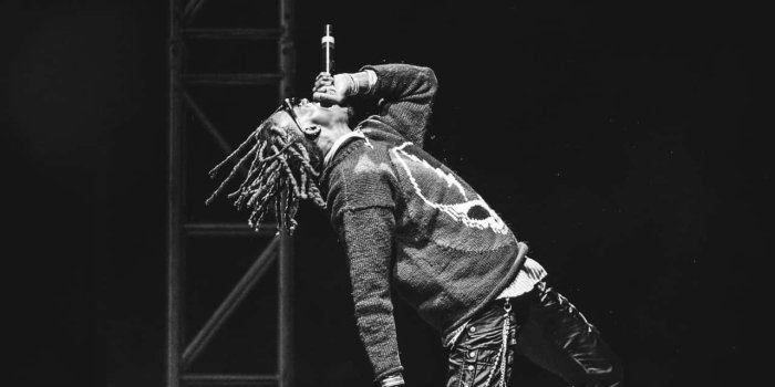 1281x1920 Download Playboi Carti Hd Stage Wallpaper | Wallpapers.com