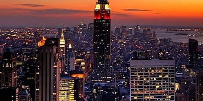 1080x1920 Download New York Skyline iPhone City Lights And Sunset Wallpaper |  Wallpapers.com