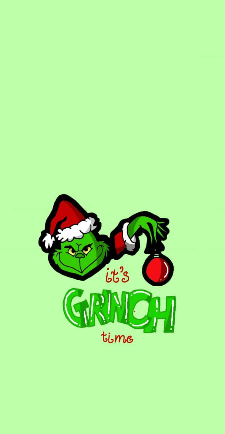 720x1384 Download Bring on The Christmas Cheer with a Cute Grinch Wallpaper |  Wallpapers.com