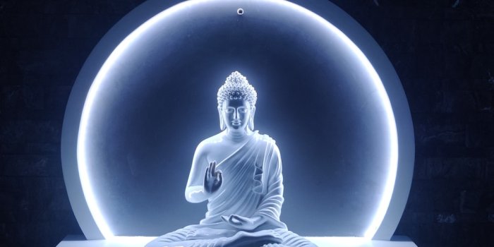 1000x1333 A buddha statue sitting in front of a blue light photo – Free Worship Image  on Unsplash
