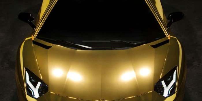 1280x1239 Download Gold Lamborghini: Experience the Luxury Wallpaper | Wallpapers.com