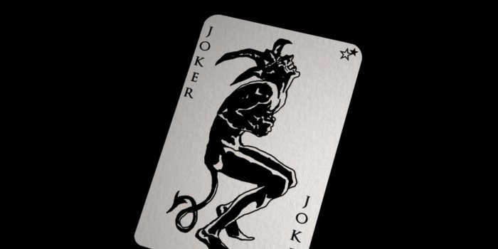 1920x1080 Download Mysterious Joker Card on a Dark Background Wallpaper | Wallpapers .com