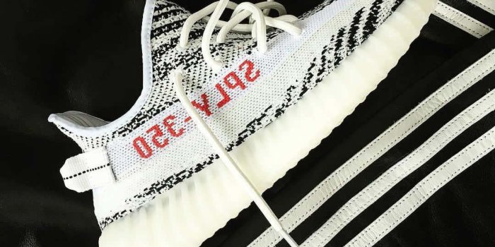 1080x908 Download White And Red Yeezy Boost Wallpaper | Wallpapers.com