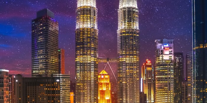 1000x1778 City buildings during night time photo