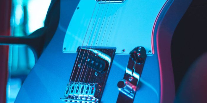 1280x1920 Neon Light Electric Guitar Wallpaper