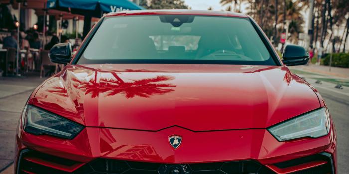 4323x5404 Red Lamborghini Urus Parked on Street