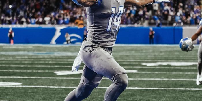 1600x2000 Amon-Ra St. Brown celebrating his game