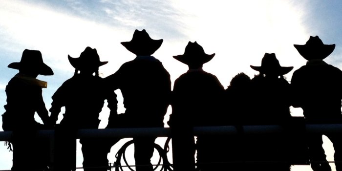 1080x1920 Silhouette of cowboys and cowgirls at