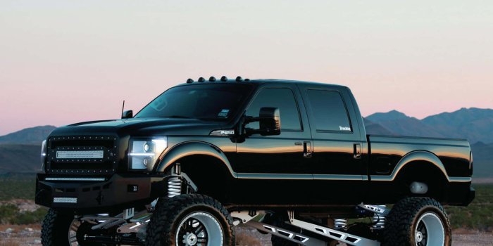 1920x1080 Black Lifted Truck Side View Wallpaper