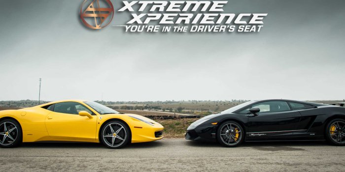 2048x1280 Ferrari Vs. Lamborghini Wallpaper