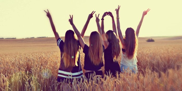 1358x900 Friends Raising Hands On Field Picture