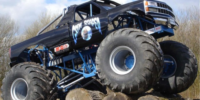 1280x1024 Download A Monster Truck Is On Top Of A