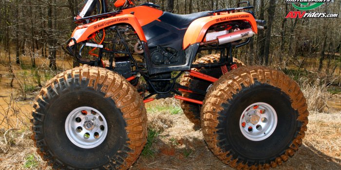 1680x1050 Arctic Cat ATV with Monster Tires