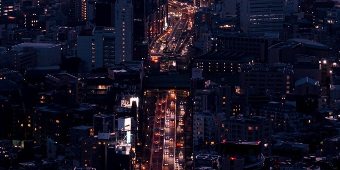 1125x2436 city buildings during night time iPhone