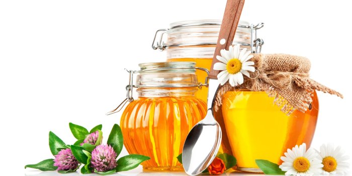 2560x1600 Sweet Serenity: HD Wallpaper of Honey Jars