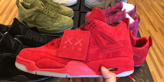 1024x768 KAWS x Air Jordan 4 Red