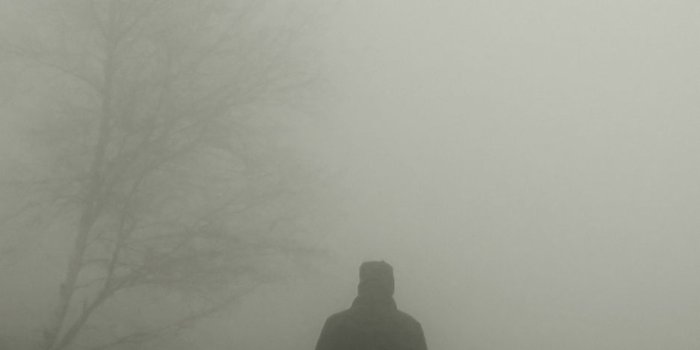 938x1668 Download wallpaper 938x1668 silhouette, fog, loneliness, alone