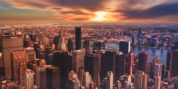 1366x768 Download wallpaper 1366x768 new york, skyscrapers, sunset