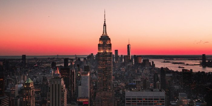 1366x768 Download wallpaper 1366x768 night city, skyscraper, skyline, night