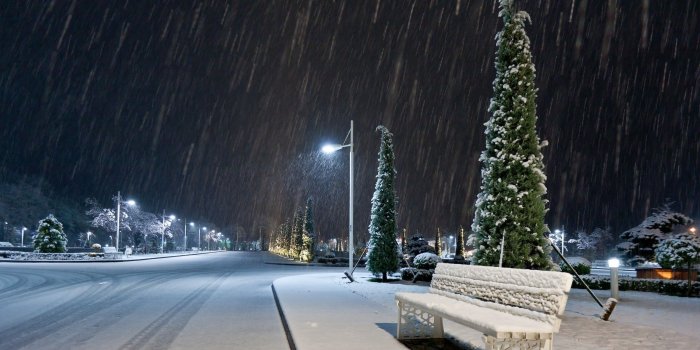 2560x1600 Wallpaper snow, winter, night, bench, lights desktop wallpaper