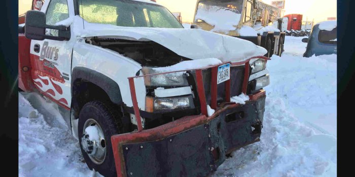 1920x1080 Sheriff: NE Iowa tow truck driver avoids injury after semi hits vehicle