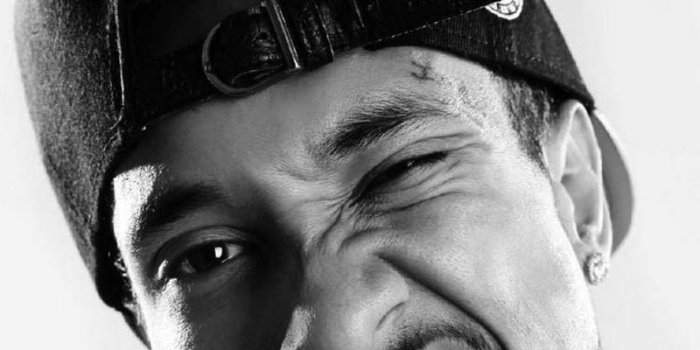 800x1200 Download wallpaper 800x1200 tyga, rapper, cap, face, tattoo iphone