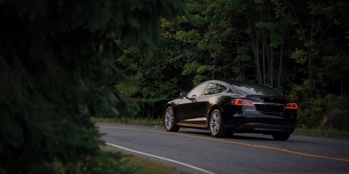 3840x2400 Download wallpaper 3840x2400 tesla, auto, black, side view, road 4k