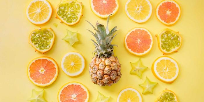 1366x768 Download wallpaper 1366x768 fruit, citrus, pineapple, yellow, lemon