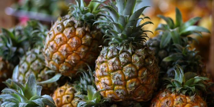 1366x768 Download wallpaper 1366x768 pineapple, fruit, market tablet, laptop