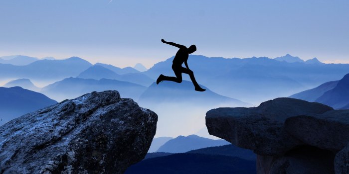 6076x3149 Timelapse photography of man jumping cliff to cliff during daytime