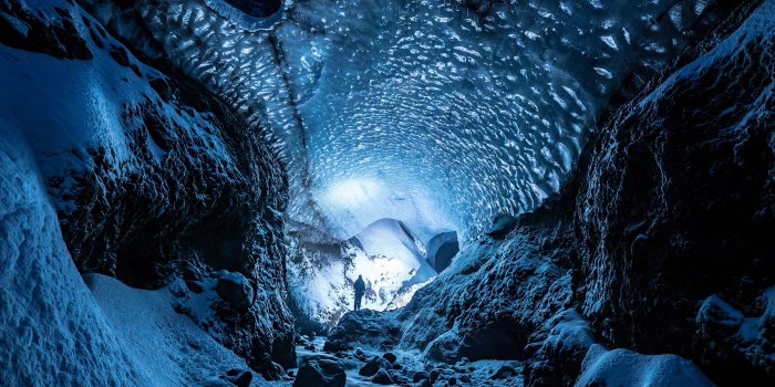 3840x2400 Download wallpaper 3840x2400 glacier, cave, man, ice, snow 4k ultra