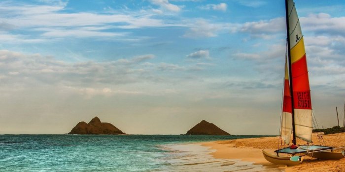 1680x1050 Catamaran On A Beautiful Beach HD desktop wallpaper : Widescreen