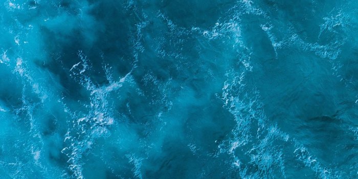 1440x2560 Download wallpaper 1440x2560 waves, water, surface, aerial view