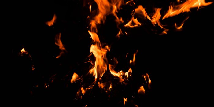 3840x2160 Download wallpaper 3840x2160 fire, bonfire, dark, flame, black 4k