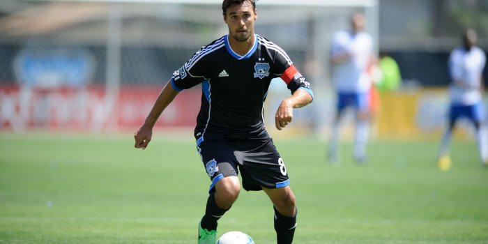 3000x1996 Soccer player in black-and-blue 8 Adidas jersey set HD wallpaper